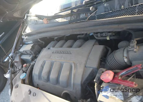 2007 Honda Odyssey Lx z USA, uszkodzony, nr VIN 5FNRL38217B120908